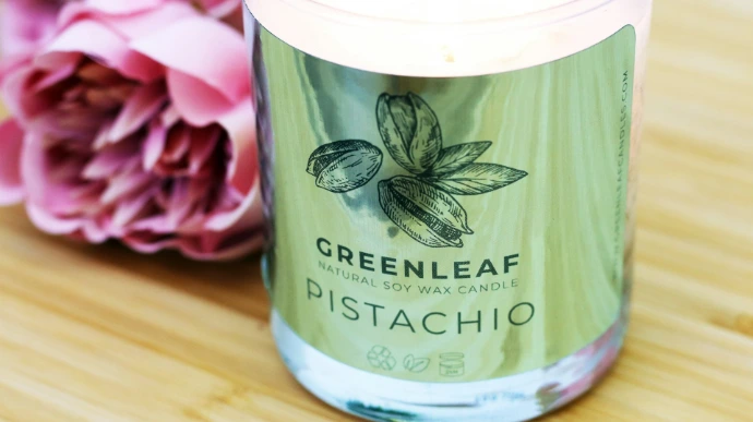 a glass jar with a Label by Since 90 Design